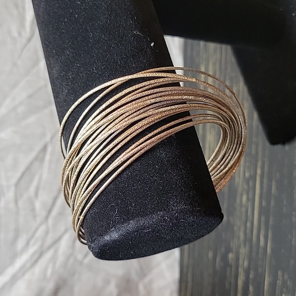 Gold Tone Bangle Bracelets - Picture 1 of 3